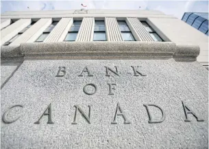  ?? REUTERS ?? A sign is pictured outside the Bank of Canada building in Ottawa.