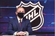  ?? Mike Stobe / TNS ?? NHL commission­er Gary Bettman prepares for the first round of the 2020 NHL Draft at the NHL Network Studio on Oct. 6 in Secaucus, N.J.