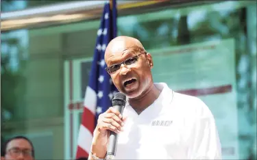  ?? Hearst Connecticu­t Media file photo ?? Stamford NAACP President Jack Bryant speaks during the community vigil to stand against hatred and violence outside of Government Center in downtown Stamford Aug. 16, 2017. Bryant died in April with COVID-19.