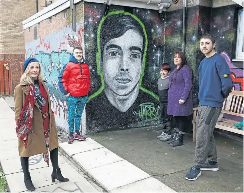  ??  ?? REVEALED: Dawn Mullady from the Pitstop Project was joined at the unveiling by Harry’s mum Ashley and his brother Kalel as well as two of Harry’s friends, Caleb Fegan and Nathan Hayes. Picture by Dougie Nicolson.