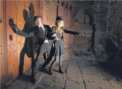  ?? Picture: Paul Reid. ?? Tour organisers Neil and Jilly Henderson ready for a frightfull­y good time at Arbroath Abbey.