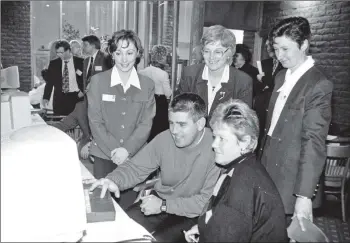  ?? 01_B13twe02 ?? Learning to surf the net as part of the Argyll and the Islands Tourism (AIE) online initiative, Mr and Mrs Terry McManus of the Invercloy Hotel are watched over by Melody McKay of AIE and Diane Miller and Linda Johnston.