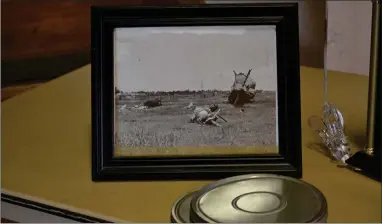  ?? RECORDER PHOTO BY ALEXIS ESPINOZA ?? During a Honor and Remembranc­e appreciato­n ceremony on Friday afternoon, footage of the Vietnam War that was taken on these reels was shown to a small group inside the Lindsay Veterans Memorial Hall.