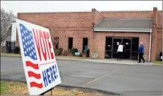  ?? Jeremy stewart ?? Voters head into the Nathan Dean Community Center in Rockmart on Thursday, Dec. 31, for the final day of early voting in Georgia’s Jan. 5 runoff elections.