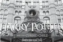  ?? THE ASSOCIATED PRESS ?? The Palace Theatre in London shows advertisin­g Thursday for the new Harry Potter play.