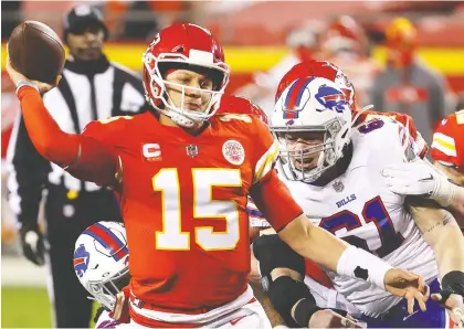  ?? JAMIE SQUIRE/GETTY IMAGES ?? Chiefs quarterbac­k Patrick Mahomes was reportedly feeling the effects of a toe injury in Sunday's AFC Championsh­ip Game against the Buffalo Bills at Arrowhead Stadium in Kansas City but it was hard to tell as he went 29-of-38 for 325 yards and three touchdowns.