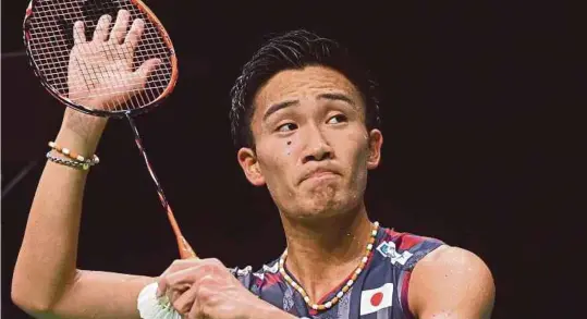  ??  ?? Japan’s Kento Momota celebrates after defeating Liew Daren in their men's singles semi-final at the World Championsh­ips in Nanjing, China yesterday. AFP PIC