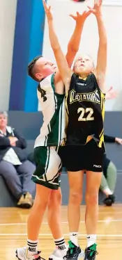  ?? ?? Competing for the rebound in the game between Rebels and Gladiators are Lenny White and Olliver Muir.