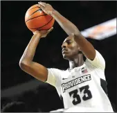  ?? File photo by Ernest A. Brown ?? Seven-foot center Dajour Dickens (33) is leaving the Providence College basketball team after playing in just three non-conference games as a freshman.