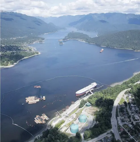  ?? JONATHAN HAYWARD / THE CANADIAN PRESS FILES ?? An aerial view of Kinder Morgan’s Trans Mountain marine terminal in Burnaby, B.C. The Trans Mountain pipeline expansion has already been seriously compromise­d and now faces even more regulatory change.