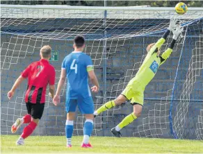  ?? PICTURES: Paul Gillis ?? Odd Down (blue) were knocked out of the FA Vase on penalties against Brislingto­n