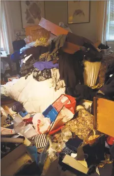  ?? Contribute­d photo ?? Heaps of clothing and belongings are strewn around the home of Lory Kelsey following a burglary at her Greenwich residence last month. She’s still coping with the damage — mentally and physically.