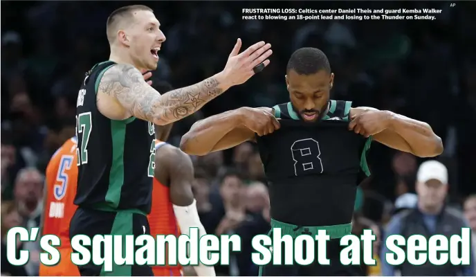  ?? AP ?? FRUSTRATIN­G LOSS: Celtics center Daniel Theis and guard Kemba Walker react to blowing an 18-point lead and losing to the Thunder on Sunday.