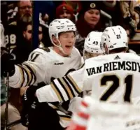  ?? KIRK IRWIN/GETTY IMAGES ?? Trent Frederic celebrates his third goal in two games, an insurance tally that gave the Bruins a 4-1 lead late in the third period.