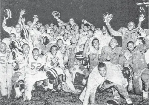  ?? Photo courtesy of Leroy Bookman ?? Led by Orsby Crenshaw and Roy Horton, Anderson’s 1961 team finished its season with a 20-13 state 4A championsh­ip win over no. 1-ranked Houston Yates in the Lions’ backyard, Jeppesen Stadium. However, it would be the fourth and final title for the...