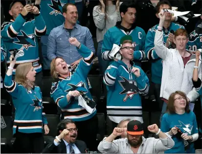  ?? ANDA CHU — BAY AREA NEWS GROUP FILE ?? Sharks fans celebrate a goal by Logan Couture in the first period against the Blues in Game 1of the Stanley Cup Western Conference finals at the SAP Center in San Jose in May of 2019. The Sharks are one of many Bay Area teams dealing with concerns about coronaviru­s.