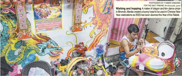  ?? PHOTOGRAPH BY YUMMIE DINGDING FOR THE DAILY TRIBUNE @tribunephl_yumi ?? Wishing and hopping A maker of dragon and lion dance props in Binondo, Manila creates a bunny head to be used in Chinese New Year celebratio­ns as 2023 has been deemed the Year of the Rabbit.