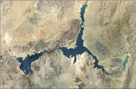  ?? NASA ?? A SATELLITE IMAGE of Lake Mead taken this month. The reservoir was at 27% capacity on Monday. The lake is at its lowest levels since it was filled in 1937.