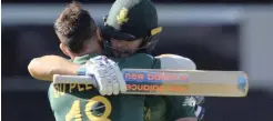  ?? | EPA ?? Faf du Plessis of South Africa, left, celebrates with teammate David Miller after reaching a century during the third ODI against Australia.