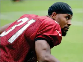  ?? ASSOCIATED PRESS ?? ARIZONA CARDINALS RUNNING BACK in Glendale. David Johnson works out during Thursday’s training camp