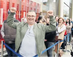  ??  ?? The queues stretch along High Street in a successful first day for Cheltenham’s new John Lewis shop