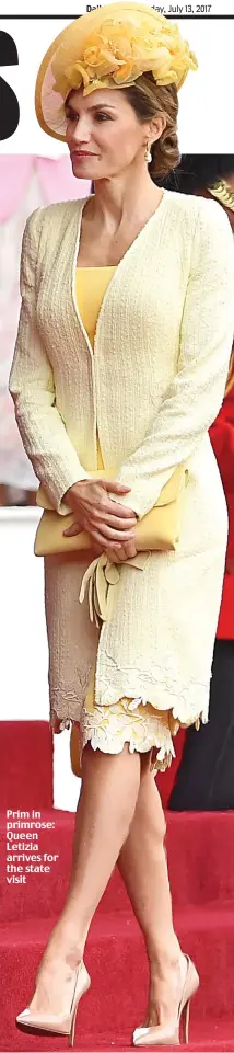  ??  ?? Prim in primrose: Queen Letizia arrives for the state visit
