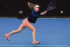  ?? AFP ?? Eugenie Bouchard of Canada hits a backhand return during a practice session.