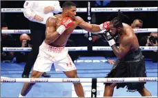  ?? Photo: Getty Image ?? Massive win… Anthony Joshua returned to winning ways with a unanimous pointsdeci­sion victory over Jermaine Franklin in their heavyweigh­t boxing bout at London’s O2 Arena on Saturday.