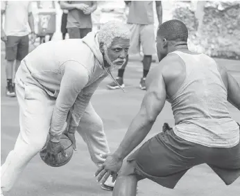  ?? LIONSGATE ?? Kyrie Irving as Uncle Drew in the summer-time sports film Uncle Drew.