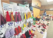  ??  ?? Earrings made by Rohingya refugee women are displayed at a bazaar held by social enterprise­s in Kuala Lumpur.