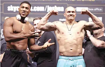  ?? ?? Anthony Joshua ( left) will try to reclaim his world heavyweigh­t boxing titles from Oleksandr Usyk … on August 20