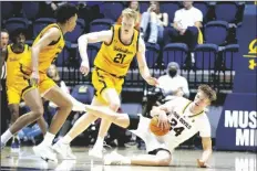  ?? D. ROSS CAMERON/AP ?? ARIZONA STATE FORWARD DUKE BRENNAN (24) goes down chasing a loose ball in front of California forward Lars Thiemann (21) during the first half of a game on Saturday in Berkeley, Calif.