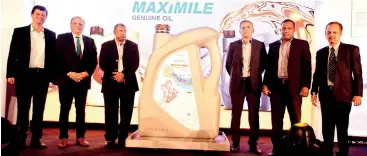  ?? PIC BY PRADEEP PATHIRANA ?? Mahindra &amp; Mahindra, Ideal Group and Lanka IOC officials including Aravinda de Silva (third from left), Lanka IOC Managing Director Shyam Bohra (second from left) and Ideal Motors Director Automotive Chaminda Wanigaratn­e (fifth from left) at the launch of Mahindra Genuine Oil – Maximile in Sri Lanka