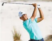  ?? ROB CARR/GETTY IMAGES ?? Xander Schauffele follows his second shot into the 13th hole during the final round of the Hero World Challenge at Albany, Bahamas on Dec. 2, in Nassau, Bahamas.