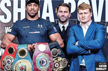  ?? PICTURE: KEVIN QUIGLEY ?? Arch rivals: Joshua, promoter Eddie Hearn and Povetkin yesterday ahead of the Wembley fight