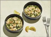  ?? TOM MCCORKLE/ TNGTON POST ?? Roasted Shrimp and Pea Couscous.