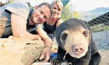  ??  ?? Hard to bear: Giles Clarke explores bear cruelty in Laos