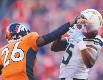  ??  ?? Darian Stewart, breaking up a pass intended for Chargers tight end Antonio Gates on Jan. 3, says playing for Broncos defensive coordinato­r Wade Phillips is “an honor.” Joe Amon, The Denver Post