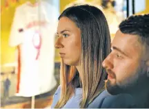  ?? CZAREK SOKOLOWSKI/ASSOCIATED PRESS ?? Belarusian sprinter Krystsina Tsimanousk­aya and her husband, Arseni Zdanevich, talk about their future Wednesday in Warsaw, Poland.