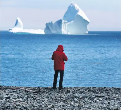  ?? PAUL DALY / THE CANADIAN PRESS FILES ?? Newfoundla­nders may curse the weather, but they never blame the climate, Rex Murphy writes.