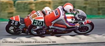  ??  ?? Carter rides aorund the outside of Bruno Luscher in 1983.