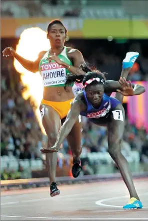  ?? DAVID J. PHILLIP / AP ?? Tori Bowie of the United States tumbles to the track after winning the gold medal in Sunday’s women’s 100m final at the World Athletics Championsh­ips in London.