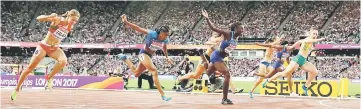  ??  ?? Sally Pearson (right) of Australia wins gold during the World Athletics Championsh­ips Women’s 100 Metre Hurdles Final at London Stadium, London. — Reuters photo