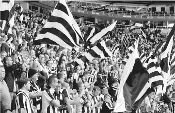  ??  ?? File photo of Newcastle United fans at St James’ Park. — Reuters photo