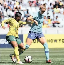  ??  ?? MAMELLO Makhabane of South Africa challenges Vivianne Miedema of the Netherland­s at Cape Town Stadium. |