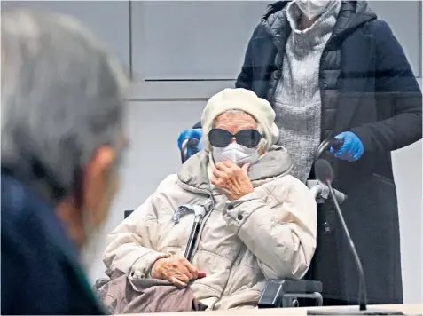  ?? ?? Irmgard Furchner, a typist for the camp commandant at Stutthof, in court yesterday in Itzehoe, Germany, faced by Josef Salomonovi­c, left, who was imprisoned in the camp as a child