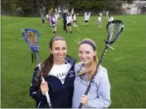  ??  ?? Ann Mahoney, left, and Lindsey Rutz have been friends since the fifth grade. They recently completed their stellar three-sport careers for the Blue Streaks.