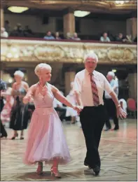  ?? PICTURES: SWNS. ?? Wood-sanding technician­s work to restore the floor of the historic Blackpool Tower Ballroom as part of its refurbishm­ent ahead of its reopening on January. The ballroom remains a popular destinatio­n for dance enthusiast­s from across the world.