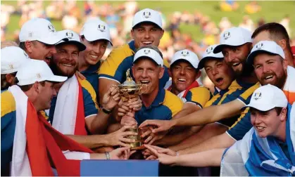  ?? ?? Europe’s captain, Luke Donald, at the centre of the team’s celebratio­ns after seeing off the US in Rome. Photograph: Phil Noble/Reuters