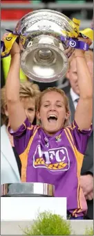  ??  ?? Katrina Parrock after winning the second of her four All-Ireland Senior camogie medals when Wexford defeated Galway in the 2010 final.